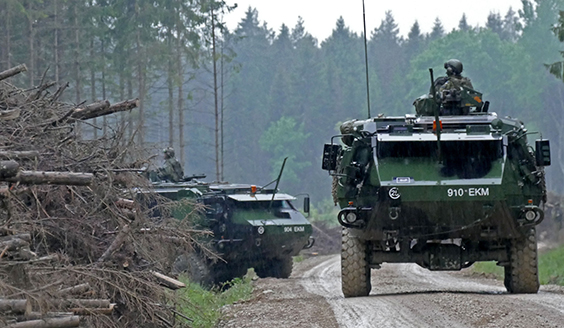 Conscripts of Finnish Rapid Deployment Force on the road with their armoured personnel carriers.