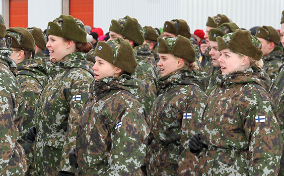 Female soldiers in form, mouths open.