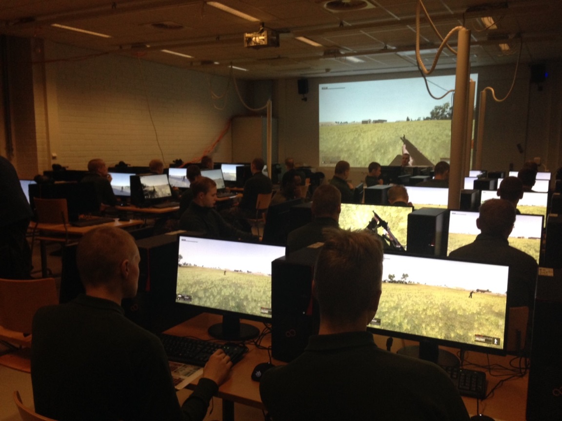 Soldiers playing in a computer class