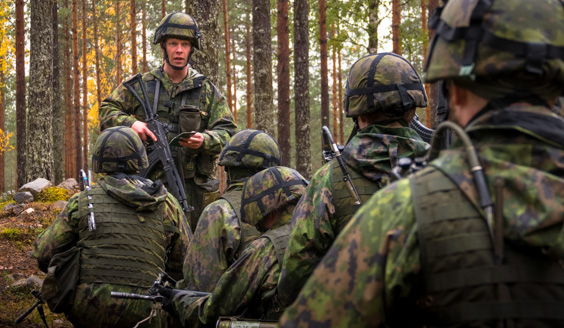 Soldiers in high knee position listening to the trainer